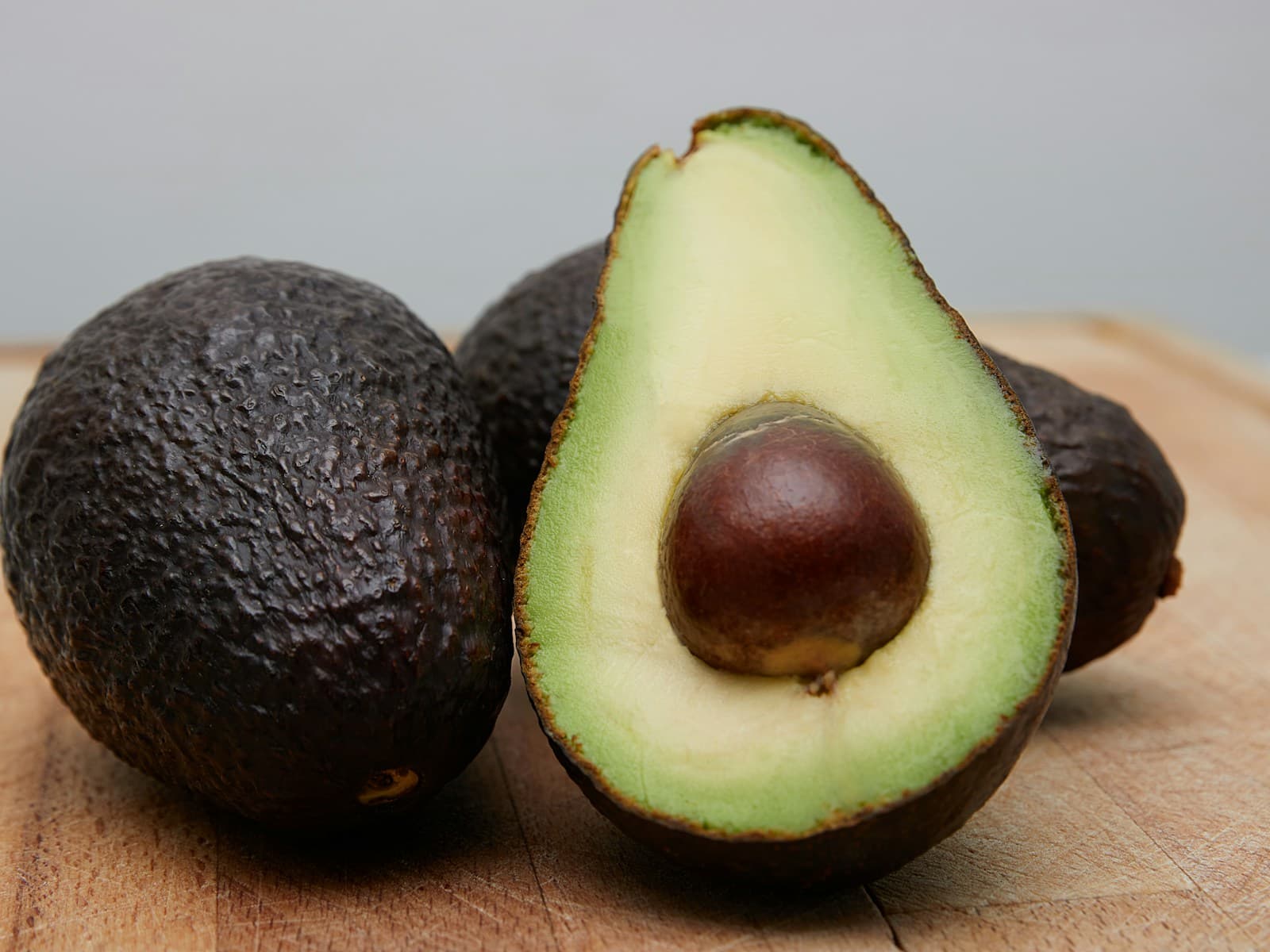 Colorful keto plate with avocado, salmon and vegetables
